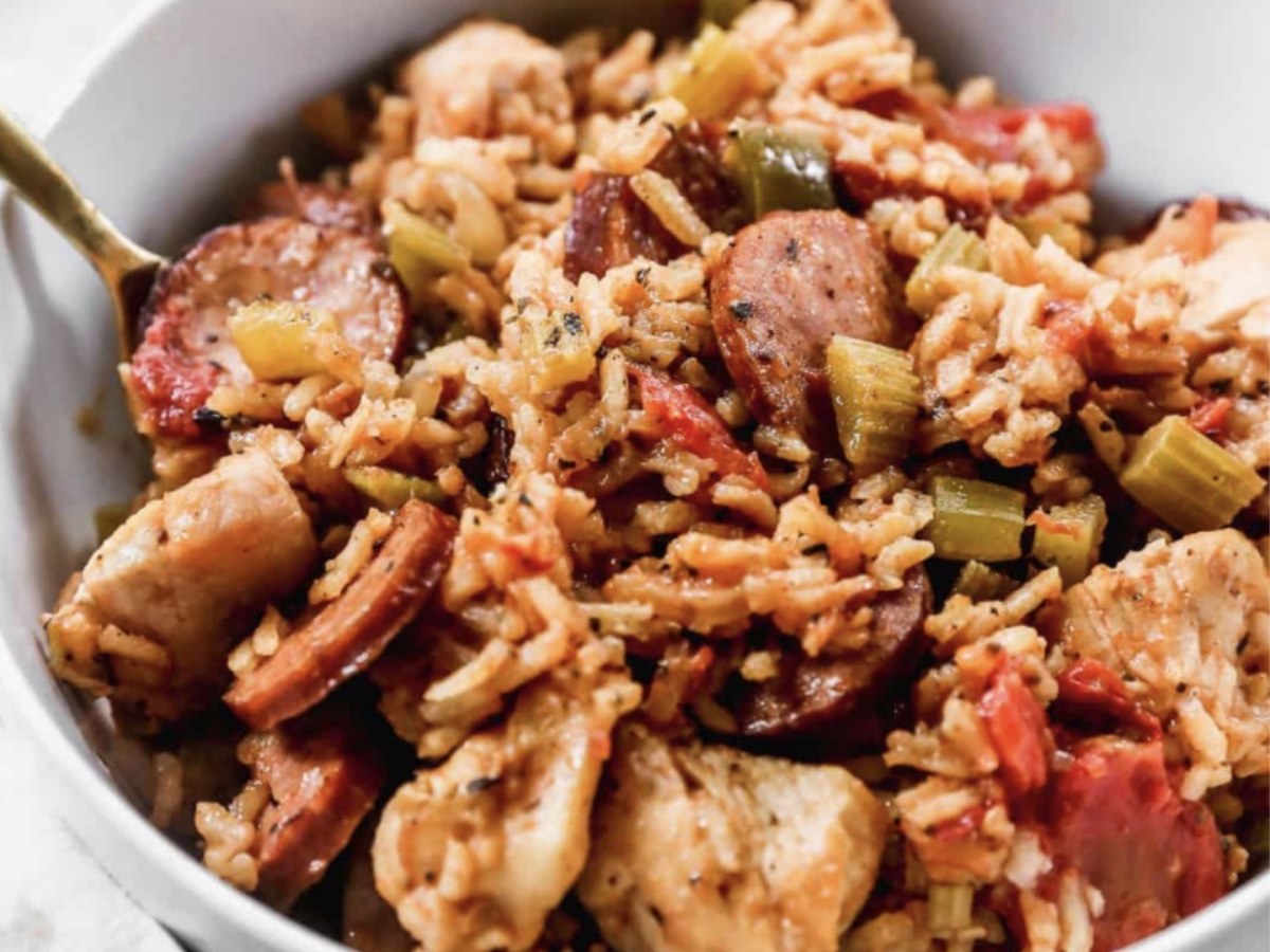 Bowl of chicken and sausage jambalaya with rice, celery and Creole seasoning